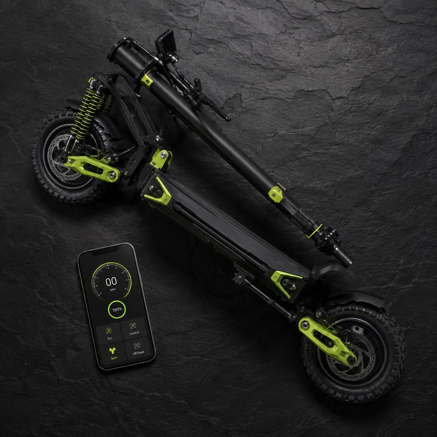 VORTEX Z10 folded flat beside a smartphone running the companion app